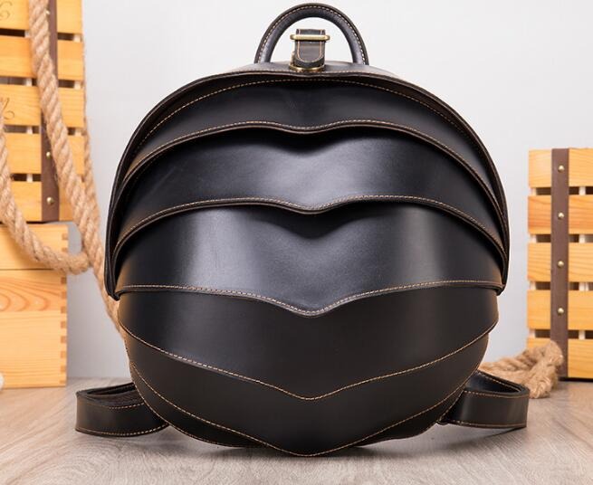 Unique round black leather backpack bag